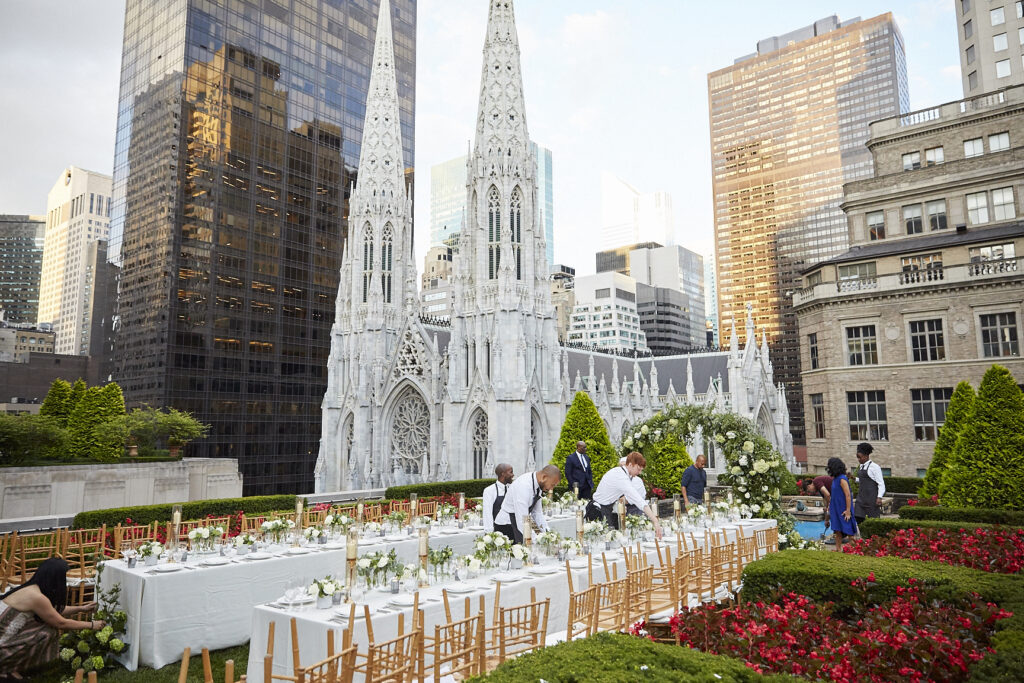 a church with a bunch of catering tables set up outside