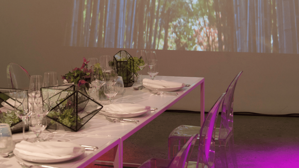a table and chairs in a room used for a catering venue
