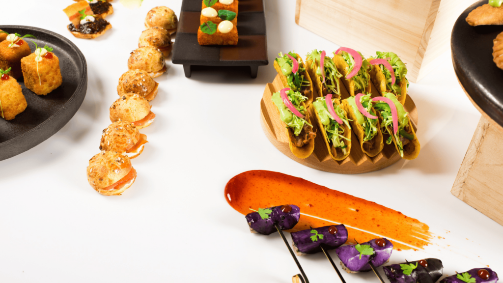 A white table with a bunch of food
