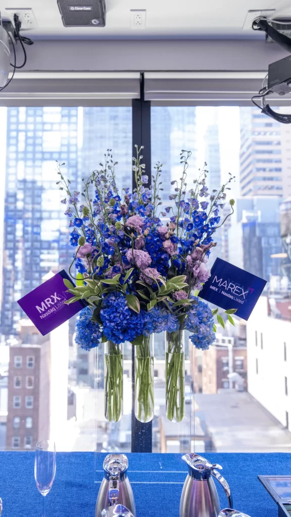 A bouquet of flowers in front of a window