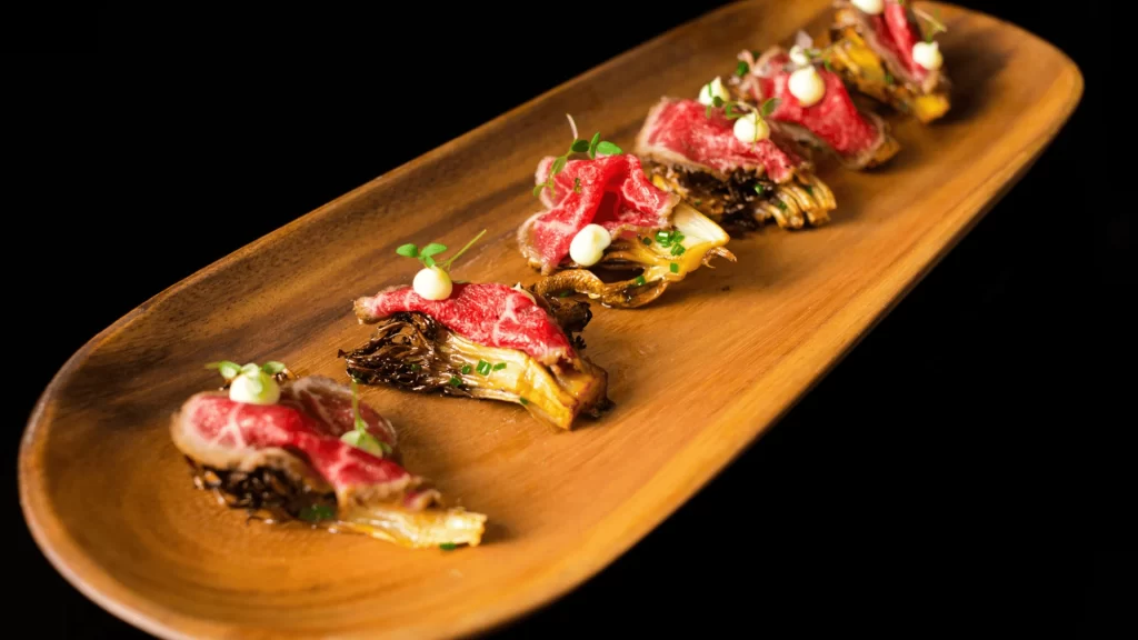 A platter of meat and expensive food