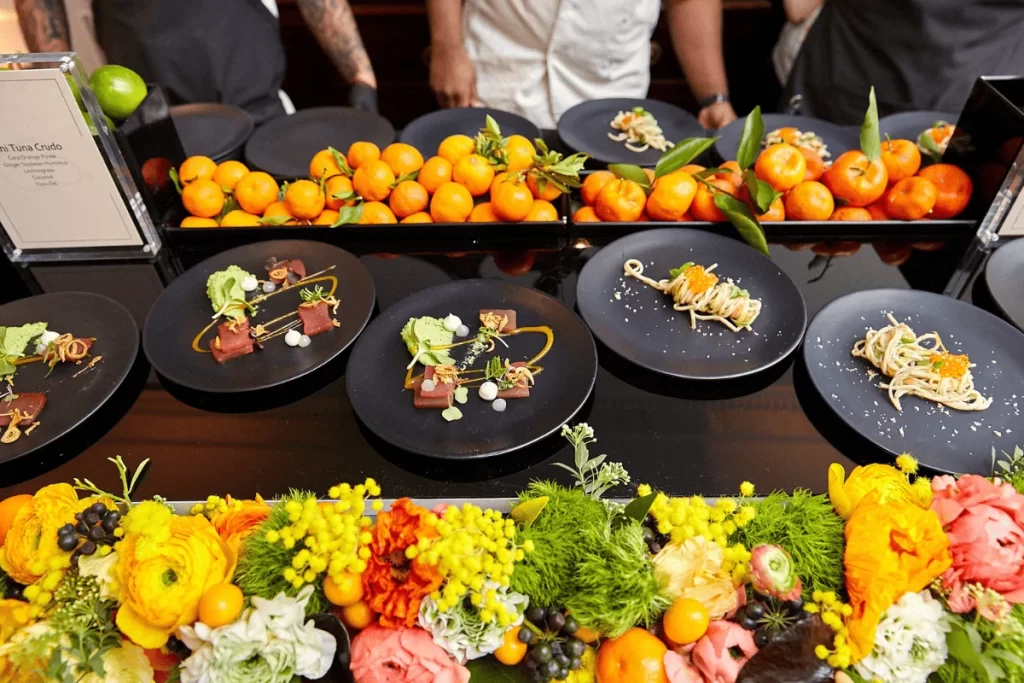 A bunch of plates of food for a catering event in the Bronx
