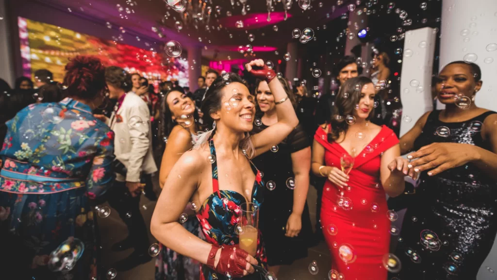 people dancing at a catering event